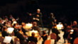 Orchestra performs a concert (out of focus)
