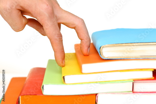 Photo: Hand and book stairs isolated Hand and book stairs isolated