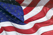 Photo: The stars and stripes, and red, white and blue colors of a US Flag blow in the wind. The stars and stripes, and red, white and blue colors of a US Flag blow in the wind.
