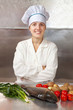 Photo: Cook woman cooking fish Cook woman cooking fish