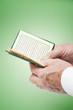 Hand with Pocket Quran