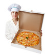 Photo: female cook with cooked pizza female cook with cooked pizza