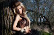 Portrait of romantic woman in fairy forest. Renaissance style