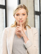 finger on lips