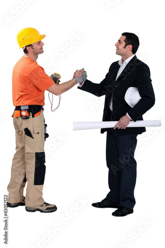 Photo: Engineering forming a pact with a tradesman Engineering forming a pact with a tradesman