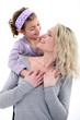 portrait of happy young mother and daughter