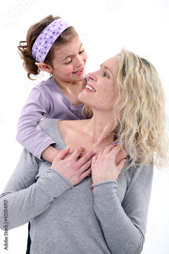 Photo: portrait of happy young mother and daughter portrait of happy young mother and daughter