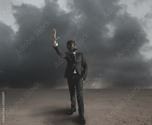 Foto: Businessman indicates radiation Businessman indicates radiation