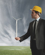 Businessman and wind turbine