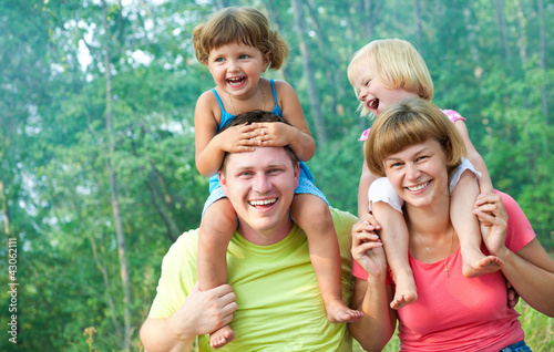 Photo: happy family in summertime happy family in summertime