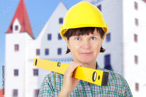 Foto: Construction worker with level Construction worker with level