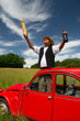 French man with his typical red car