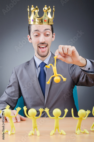 Photo: Boss with figures of his subordinates Boss with figures of his subordinates