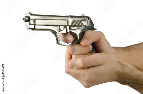 Photo: Gun in the hand on white Gun in the hand on white