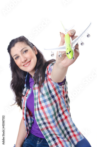 Photo: Girl preparing to travel for vacation Girl preparing to travel for vacation