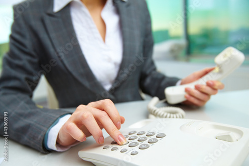 Photo: Pressing telephone buttons Pressing telephone buttons
