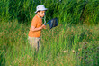 Little child hunting for butterfly
