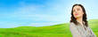 Pretty woman standing at beautiful countryside background. Natur