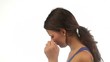 Sad young woman crying isolated