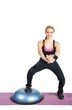 Fit young female pilates instructor showing different exercises