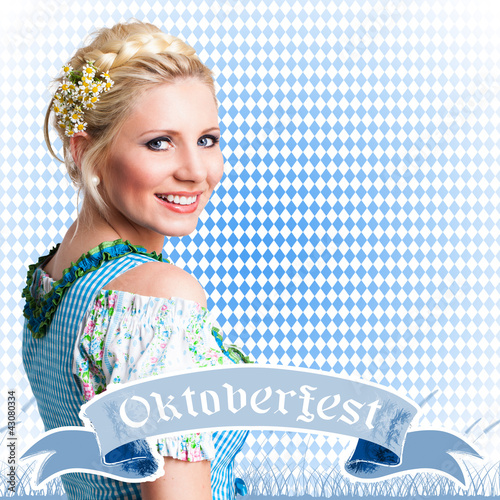 Photo: Frau im Dirndl vor Rautenmuster Frau im Dirndl vor Rautenmuster