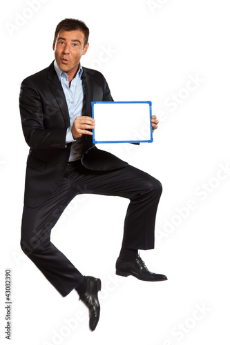 Foto: one business man jumping holding showing whiteboard one business man jumping holding showing whiteboard