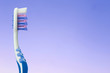 toothbrush on blue background