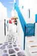 Beautiful whitewashed street in the old town of Mykonos, Greece
