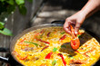 Cooking Traditional Paella Outdoors