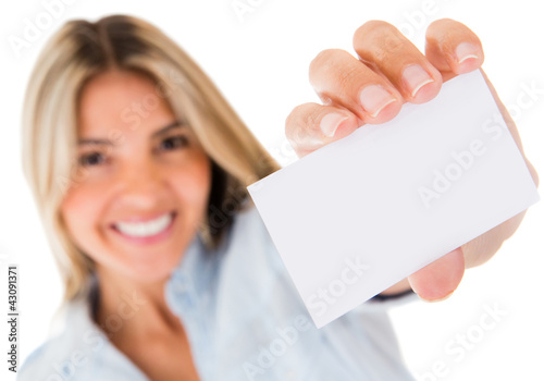 Photo: Woman holding a contact card Woman holding a contact card