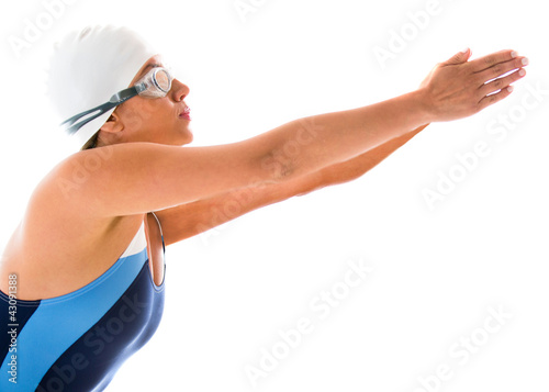 Foto: Female swimmer diving Female swimmer diving