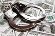 Dollars and handcuffs
