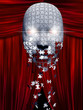 Puzzle pieces fall away from mask in theater backgropund
