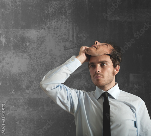Photo: Businessman and mask Businessman and mask