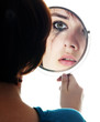 young girl looking in the mirror and crying - sensitive eyes..