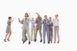 Very happy business people jumping and clenching their fists