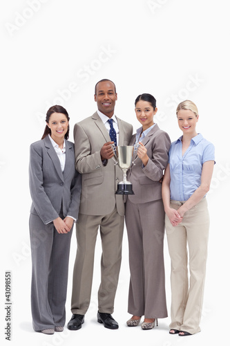 Photo: Business team holding a cup Business team holding a cup