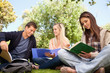 Low angle-shot of three young people working