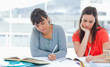 Two students doing homework together