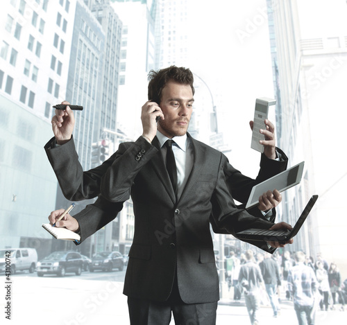 Foto: Businessman multitasking Businessman multitasking