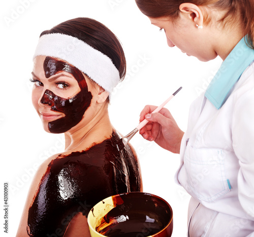 Photo: Girl having chocolate body mask. Girl having chocolate body mask.