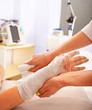 Bandaging patient in hospital.