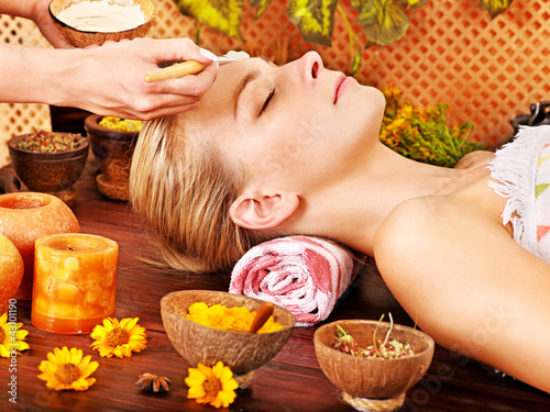 Photo: Woman getting facial massage . Woman getting facial massage .