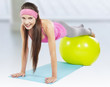 attractive fit woman pilates exercise isolated