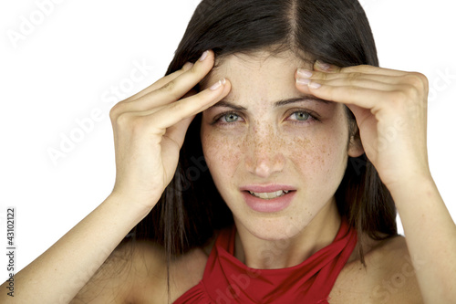 Photo: Beautiful female model with freckles suffering headache Beautiful female model with freckles suffering headache