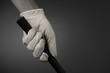 Foto: Closeup of a Golfers Gloved Hand on Club Closeup of a Golfers Gloved Hand on Club