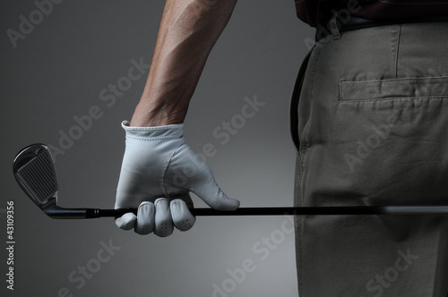 Foto: Closeup of Golfer with Club Closeup of Golfer with Club