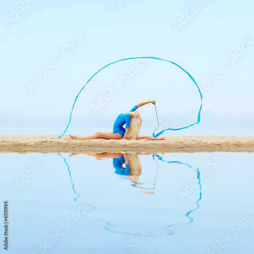 Photo: girl training on beach girl training on beach