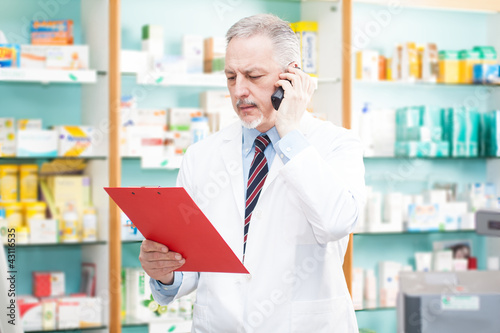 Foto: Pharmacist in his shop Pharmacist in his shop