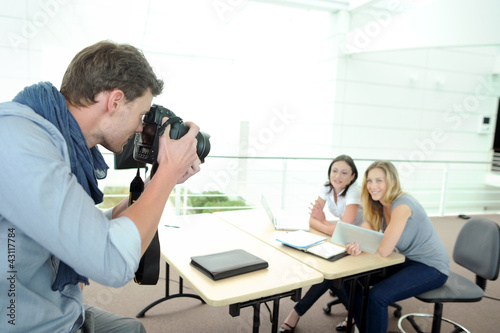 Photo: Photographer taking pictures of models Photographer taking pictures of models